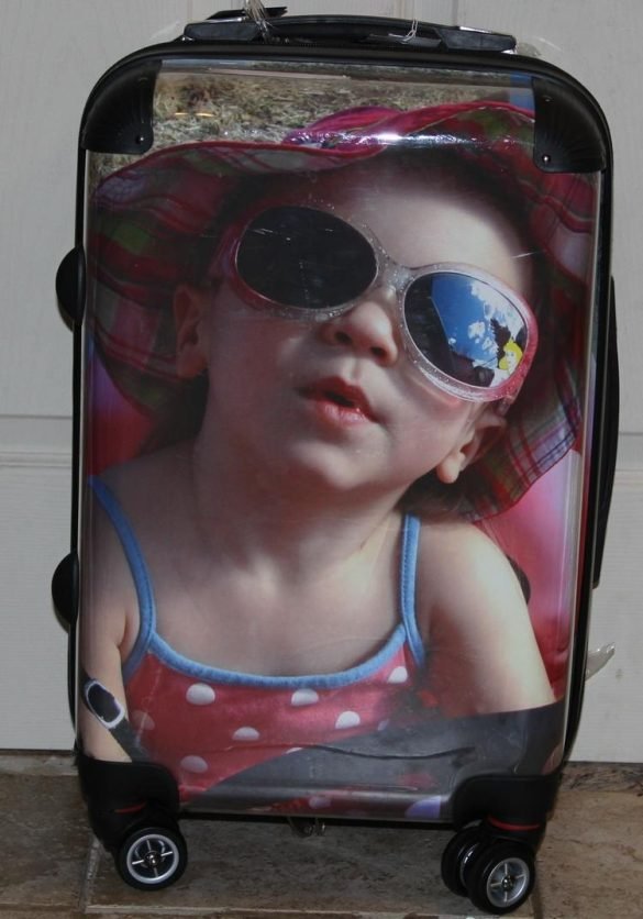 personalized luggage from luggage pros with a little girl wearing pink