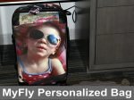 picture of personalized suite case from luggage pros with little girl wearing pink hat