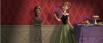 Anna from Disney's Frzen standing next to a mond of candy that looks like the land of Sugar Rush in “Wreck-It Ralph